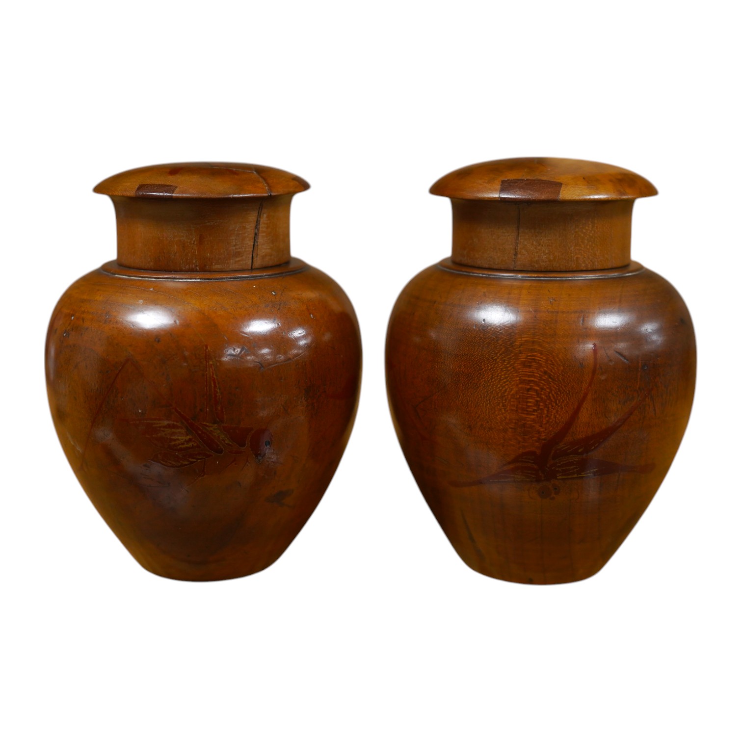 A pair of 18th century lacquered pear wood tea caddies, as seen in Pinto's book, page 293 and plate 315 (D), 12.5cm tall. Condition - repairs to covers, some wear to lacquer